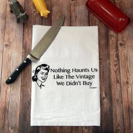 Nothing Haunts Us Like the Vintage We Didn't Buy Tea Towel